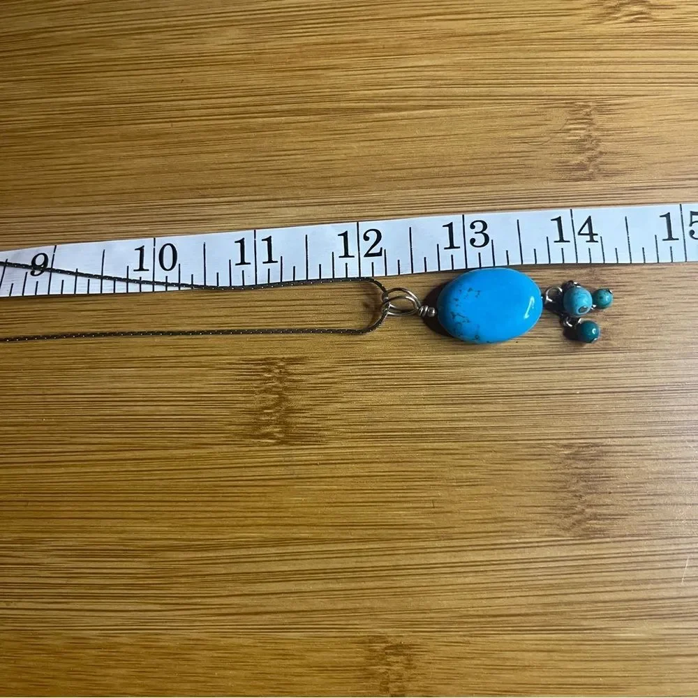 Anthro Elegant Silver and Turquoise Pendant Necklace